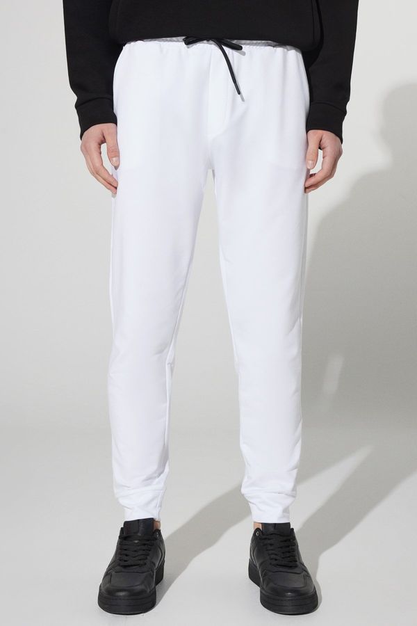 AC&Co / Altınyıldız Classics AC&Co / Altınyıldız Classics Men's White Standard Fit Normal Cut, Pocket Comfort Cotton Sweatpants.