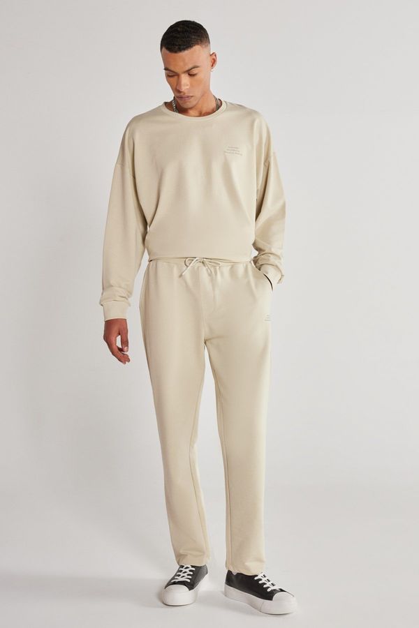 AC&Co / Altınyıldız Classics AC&Co / Altınyıldız Classics Unisex Beige Standard Fit Normal Cut, Flexible Cotton Sweatpants with Pockets.