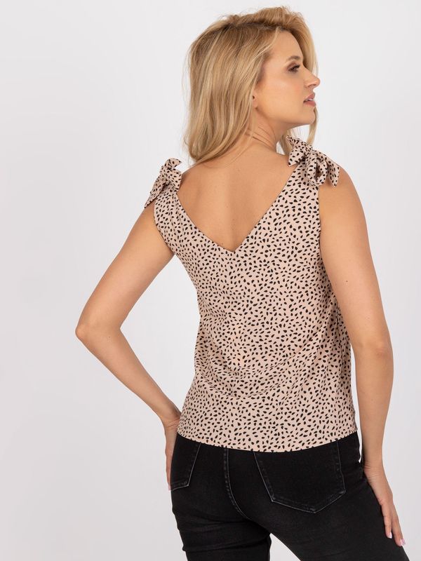 Fashionhunters Airy beige top with RUE PARIS print