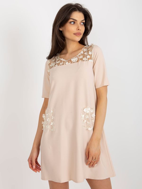 Fashionhunters Beige cocktail dress with floral appliqué