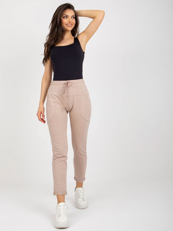 Fashionhunters Beige women's sweatpants with pockets