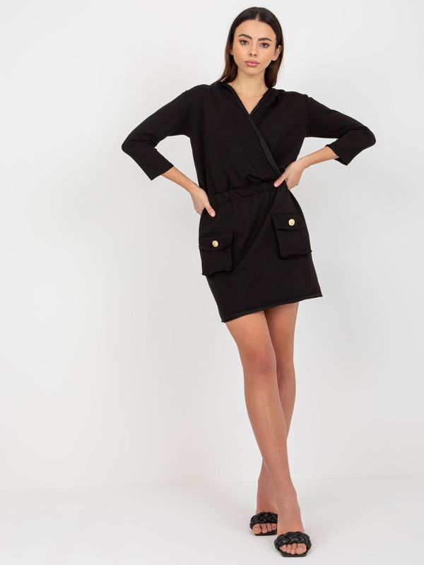 Fashionhunters Black clutch sweatshirt dress with pockets by OCH BELLA