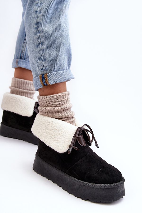 Kesi Black snow boots on the Olimuka platform with sheepskin