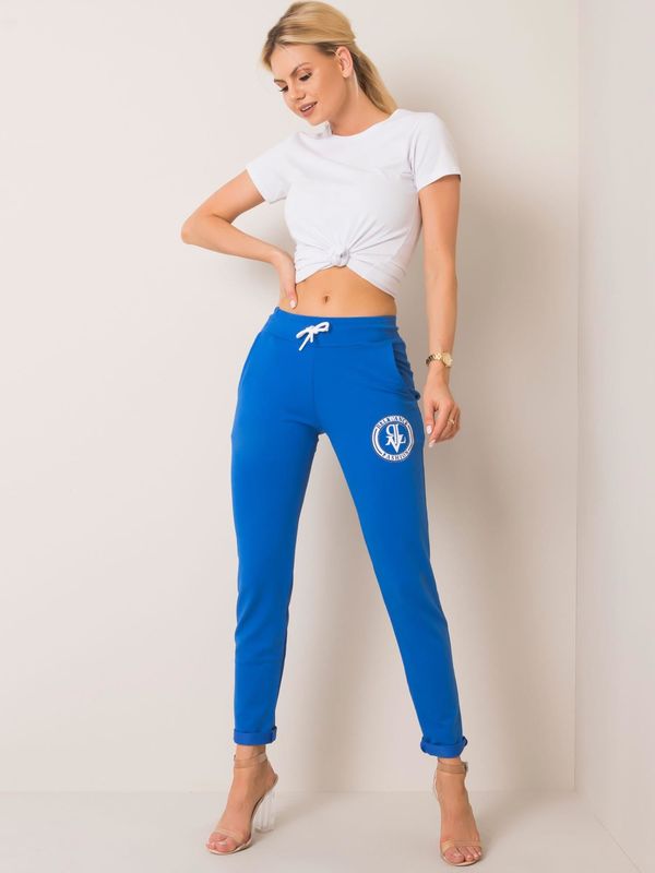 Fashionhunters Blue sweatpants with appliqué