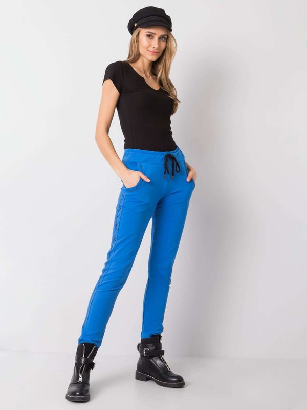 Fashionhunters Blue sweatpants with appliqué