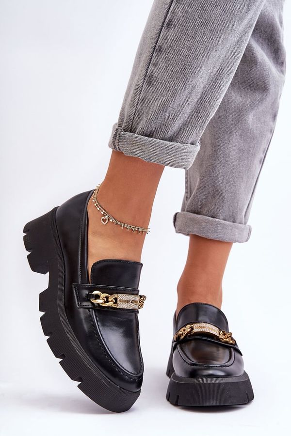 Kesi Classic moccasins on a massive black catch me platform!