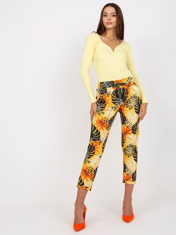 Fashionhunters Cotton sweatpants with yellow pattern