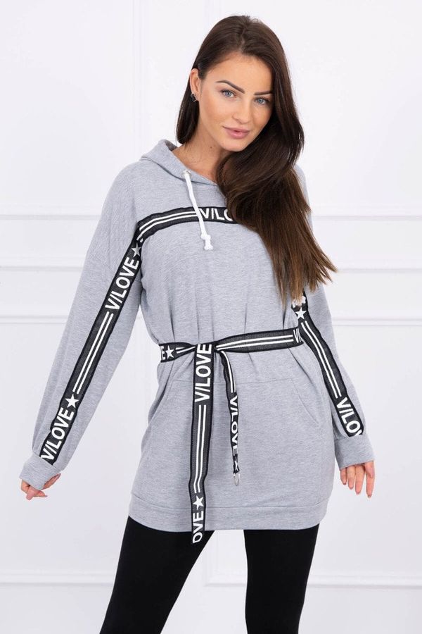 Kesi Dress decorated with a tape with gray inscriptions