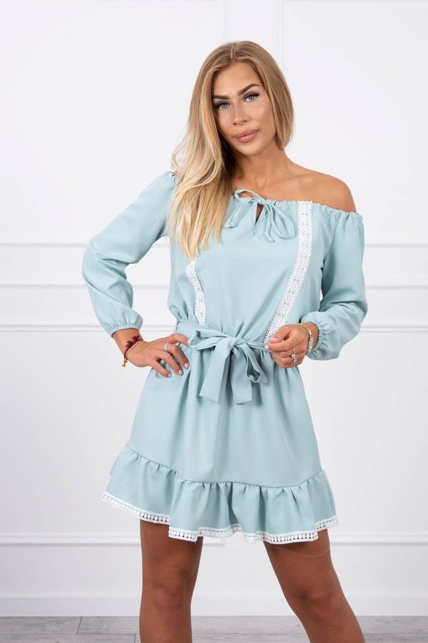 Kesi Dress on shoulders and lace dark mint