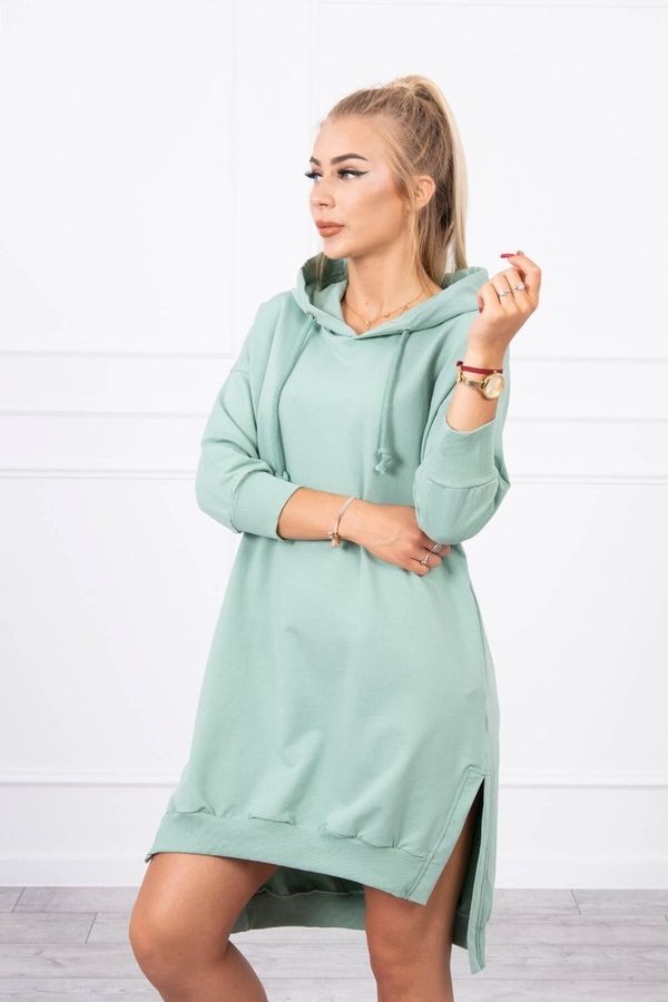 Kesi Dress with a hood and a long back in dark mint