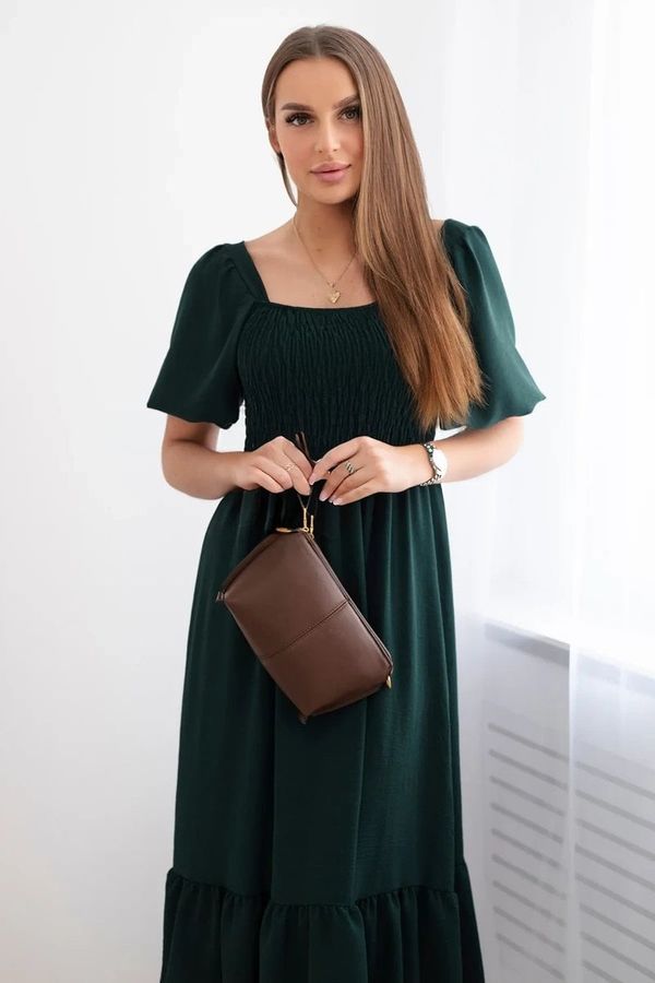 Kesi Dress with a pleated neckline of dark green color