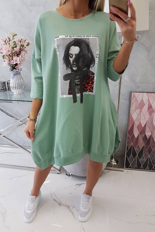 Kesi Dress with print and flared bottom dark mint