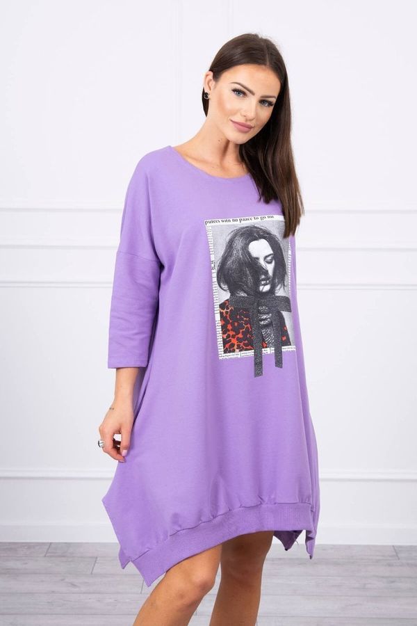 Kesi Dress with print and flared bottom of purple color