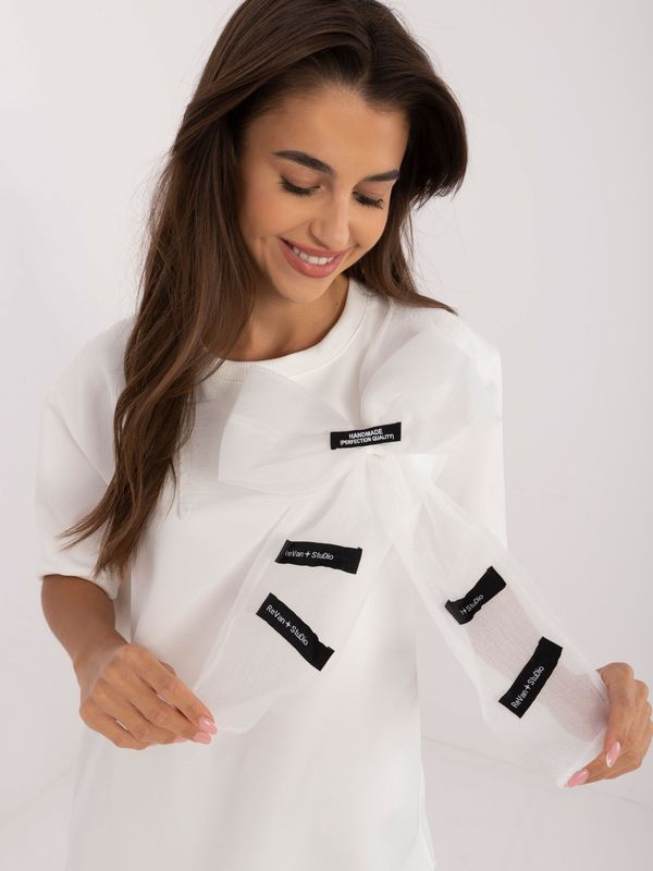 Fashionhunters Ecru formal blouse with bow and inscriptions