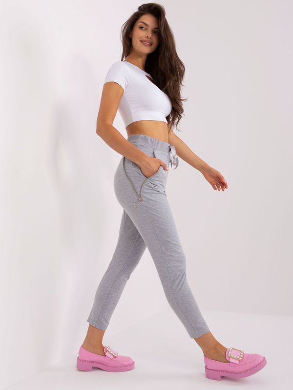 Fashionhunters Grey women's sweatpants with tie