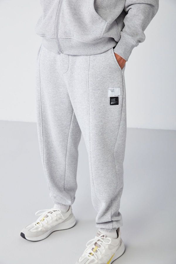 GRIMELANGE GRIMELANGE Rowan Men's Relaxed, Ribbed Front, Decorative Labeled, Grey Melange Sweatpants