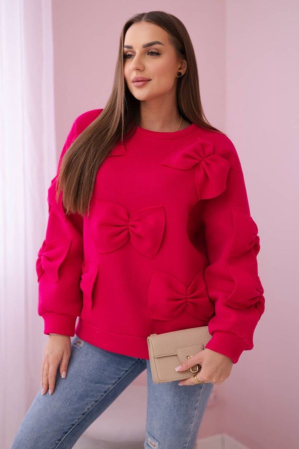 Kesi Insulated sweatshirt with fuchsia-colored decorative bows