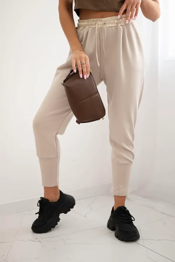 Kesi Włoski Kesi Włoski Butter-soft pants with a golden waistband cuff beige