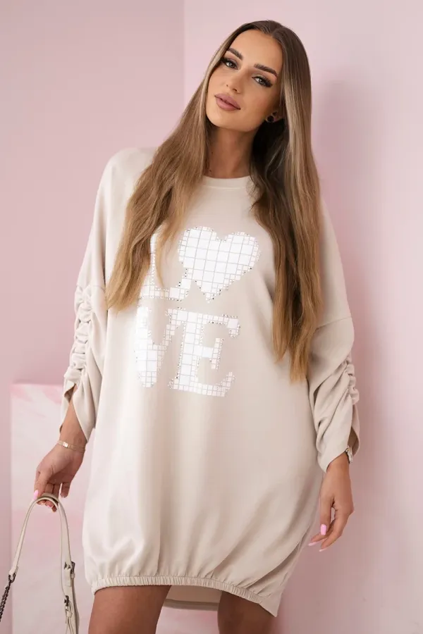 Kesi Włoski Kesi Włoski Dress with a longer back and print beige