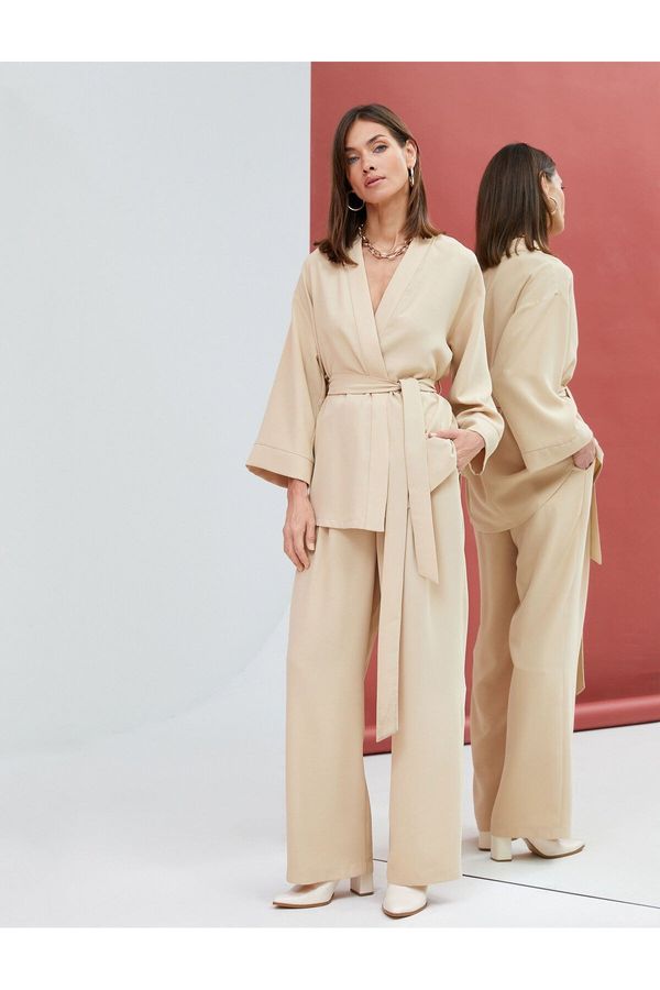 Koton Koton Fabric Palazzo Trousers with Pockets, Belted Waist and Pleated.