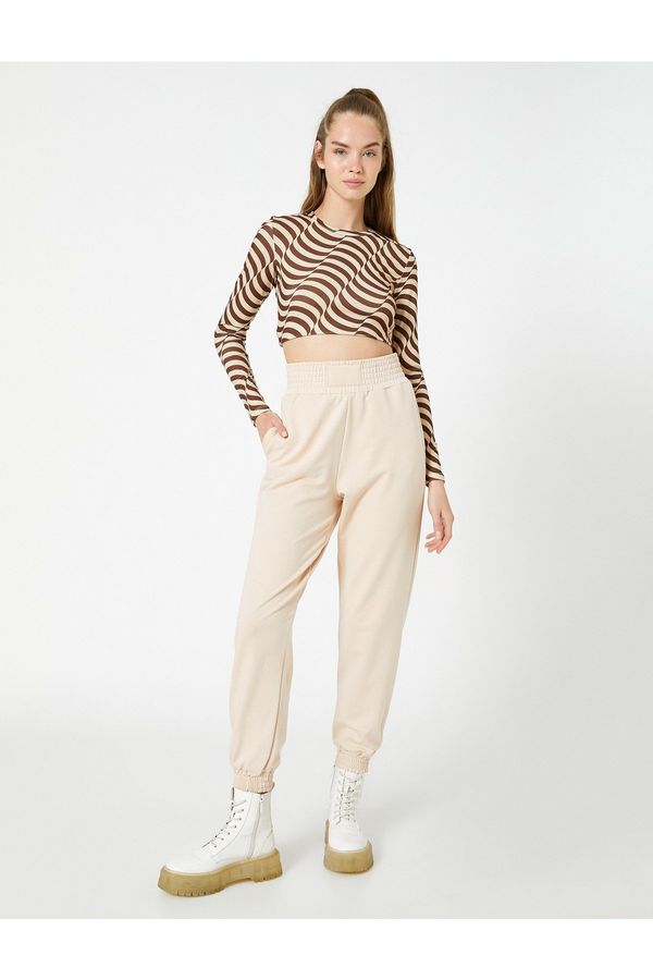 Koton Koton Jogger Sweatpants High Waist with Pocket Details.