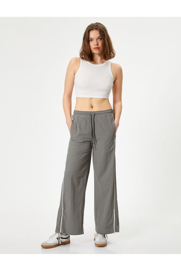 Koton Koton Parachute Trousers with Wide Leg Pockets and Tied Waist