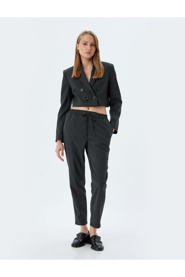 Koton Koton Pocketed Elastic Waist High Waist Jogger Carrot Cut Trousers