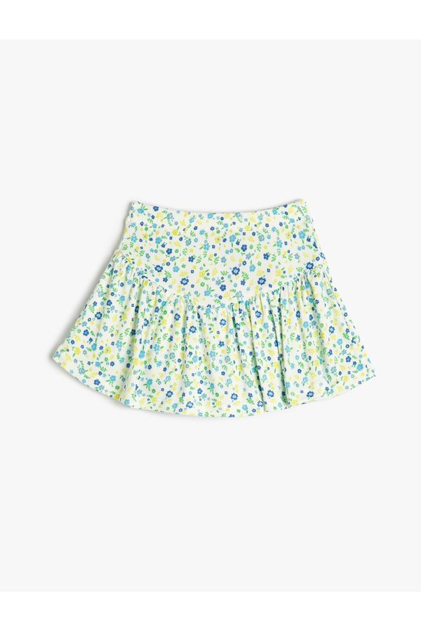 Koton Koton Shorts with a skirt with floral ruffles and an elasticated waist with a ribbed waist.