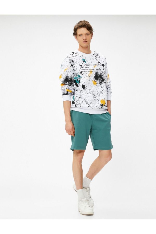 Koton Koton Shorts with a tie-waist Slim Fit Shorts with Pockets and Printed Labels.