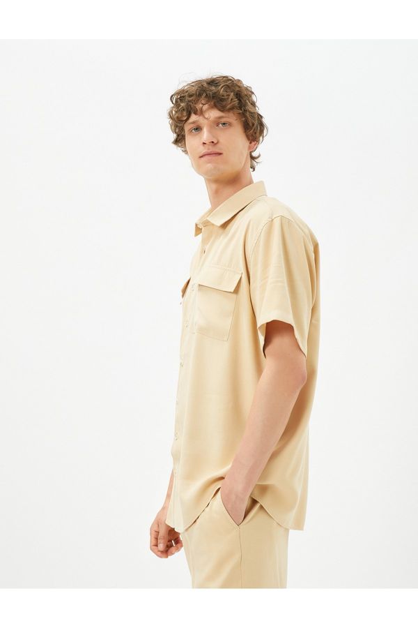 Koton Koton Summer Shirt with Short Sleeves, Covered and Double Pocketed, Classic Collar with Button.