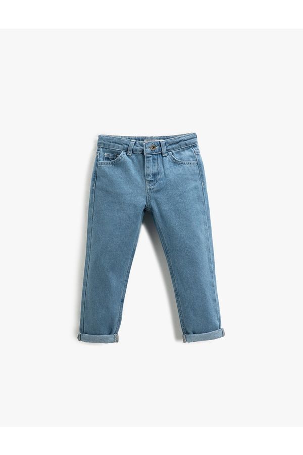 Koton Koton The jeans are a relaxed fit. The legs are rolled up - Mom Jeans.