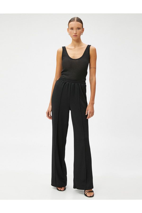 Koton Koton Wide Leg Trousers with Ribs and Elastic Waist.