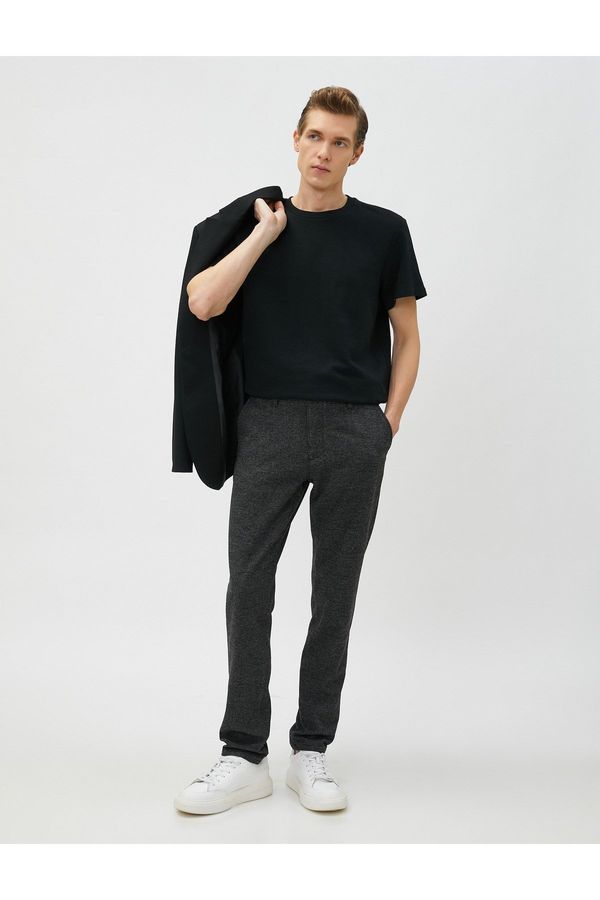 Koton Koton Woven Trousers with Crowbarn Detailed Buttons and Pockets.