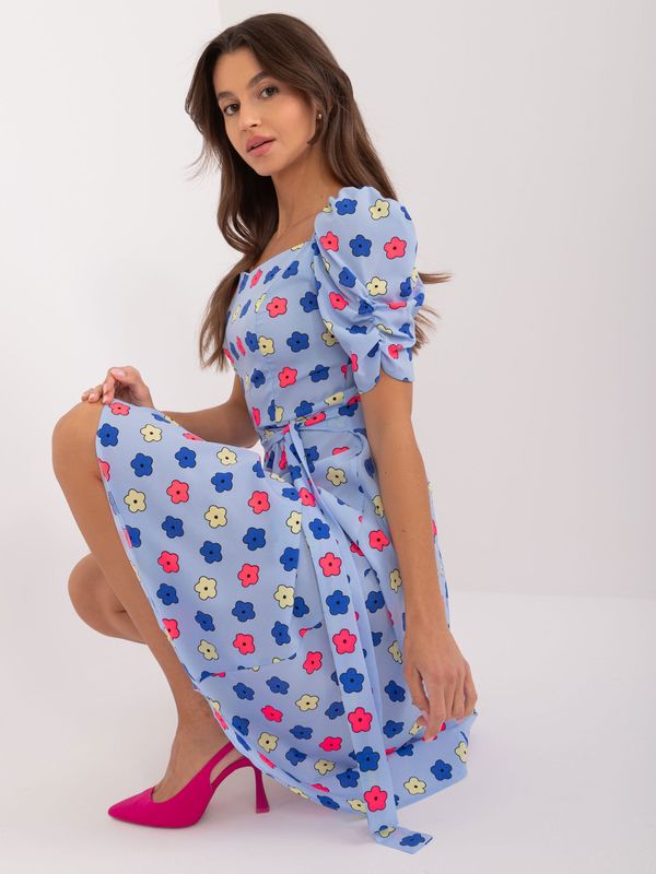 Fashionhunters Light blue knee-length dress with a floral pattern