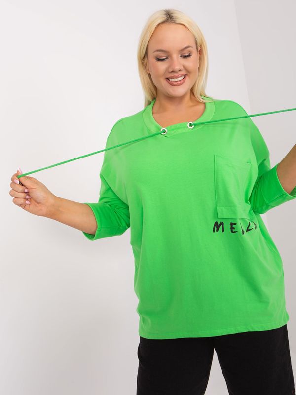 Fashionhunters Light green loose plus size blouse with pocket