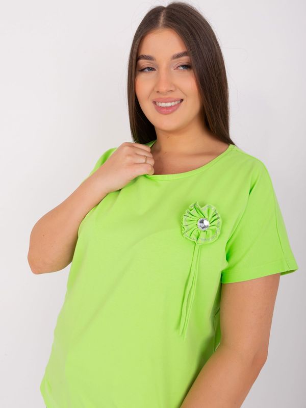 Fashionhunters Light green oversized women's blouse with trim