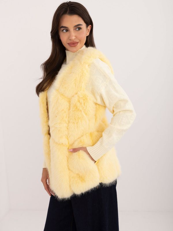 Fashionhunters Light yellow vest with fur