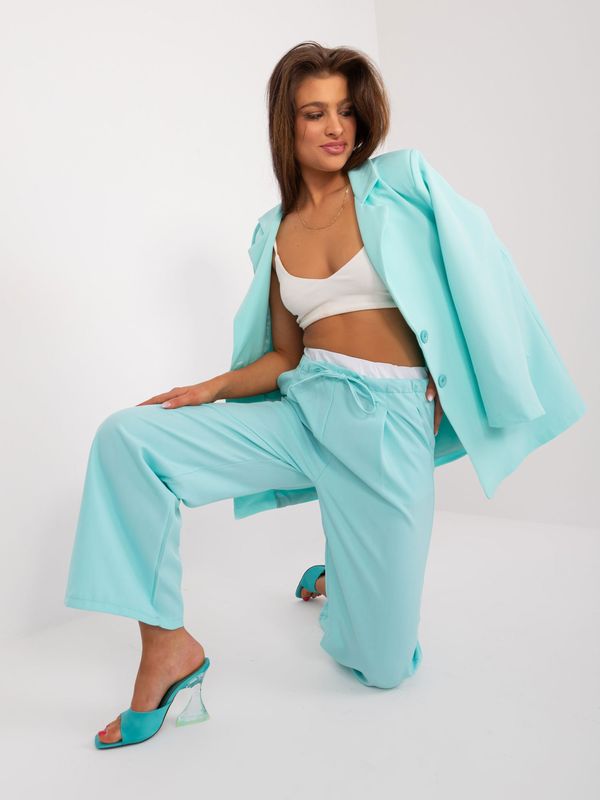 Fashionhunters Mint fabric trousers with white belt