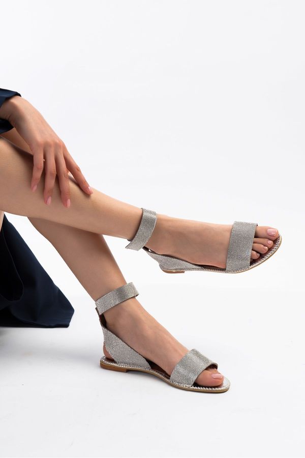 NİŞANTAŞI SHOES NİŞANTAŞI SHOES Earth Silver Stone Detail Ankle Tied Flat Sole Velcro Women's Sandals