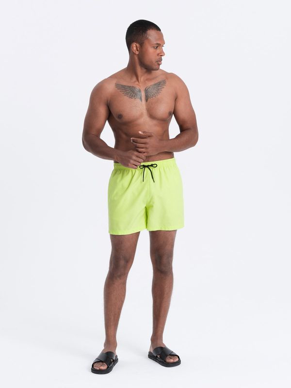 Ombre Ombre Neon men's swim shorts with magic print effect - lime green