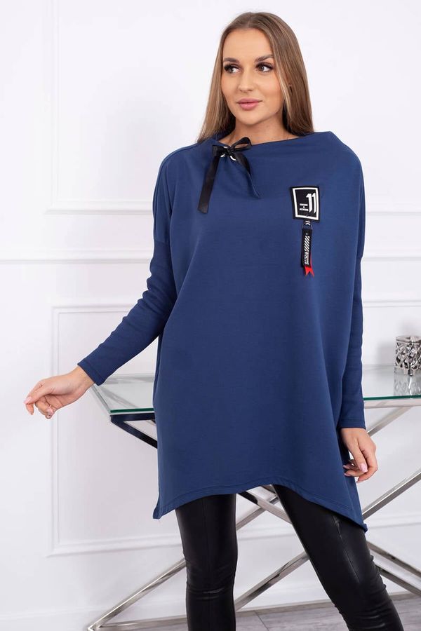 Kesi Oversize sweatshirt with asymmetrical hips jeans