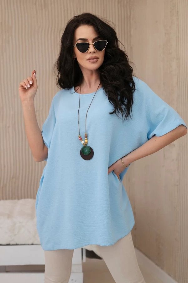 Kesi Oversized blouse with blue pendant
