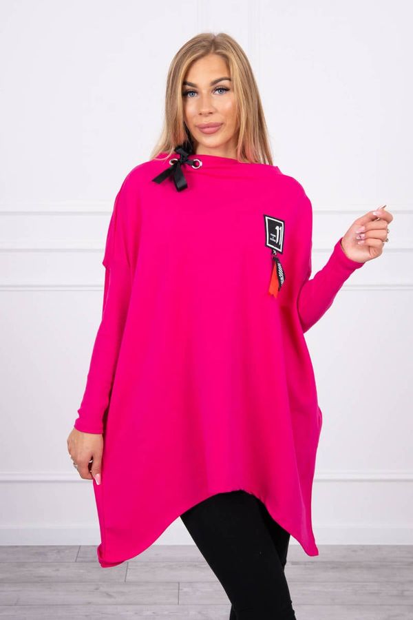 Kesi Oversized sweatshirt with asymmetrical sides in fuchsia color