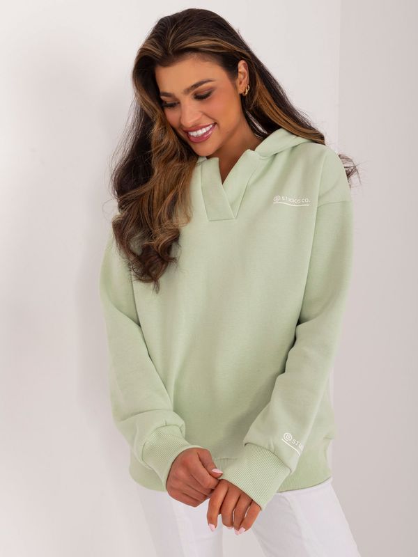 Fashionhunters Pistachio women's hoodie