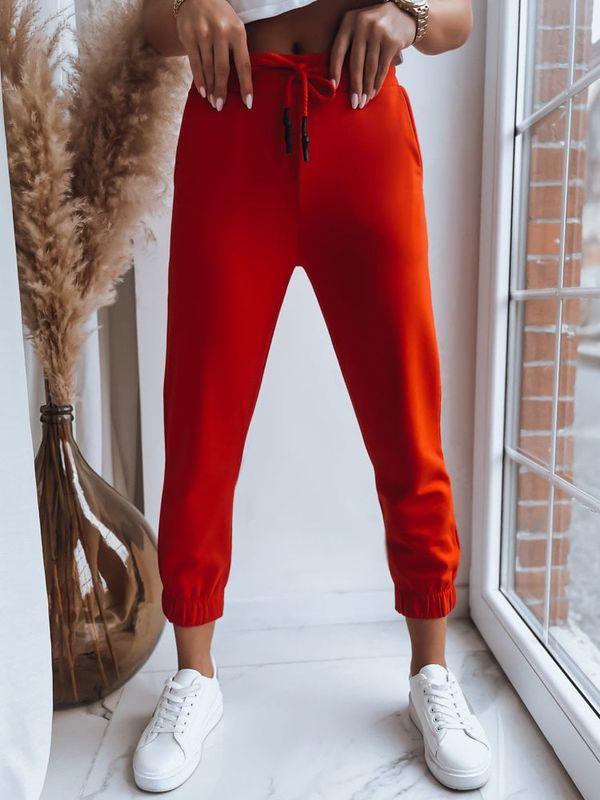 DStreet Spodnie dresowe damskie MADMAX pomarańczowe Dstreet