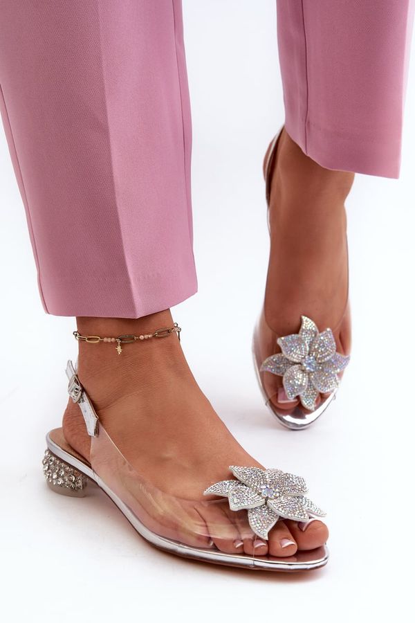 Kesi Transparent low-heeled sandals with silver D&A embellishment