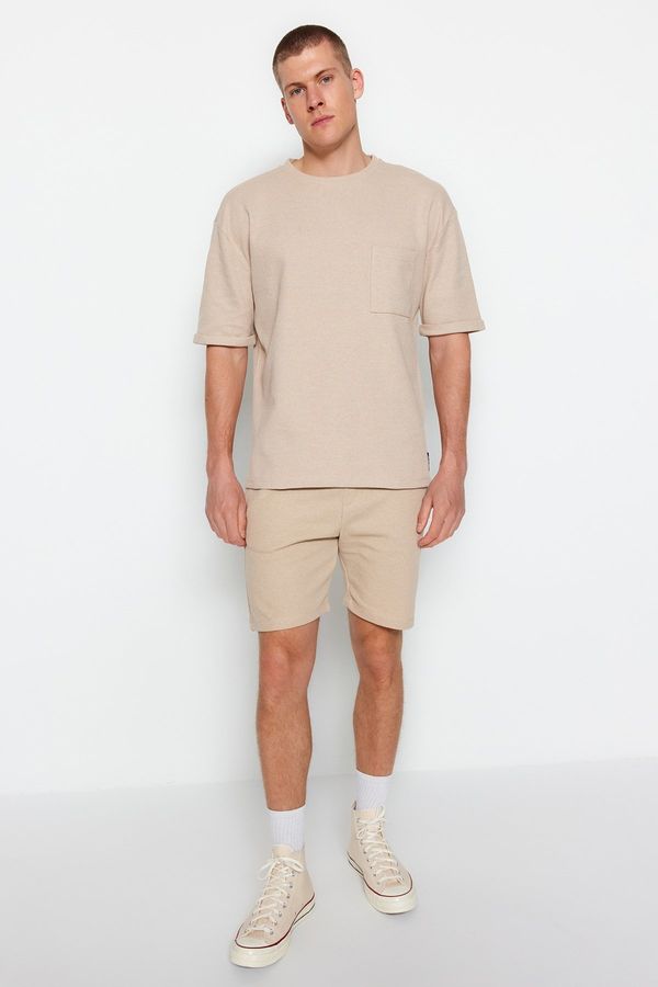 Trendyol Trendyol Beige Oversize/Wide Cut Crew Neck Short Sleeve Pocket Label Detailed T-Shirt