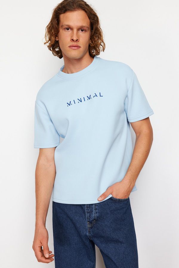 Trendyol Trendyol Blue Relaxed/Comfortable Cut Fluffy Text Printed Short Sleeve T-Shirt with Solid Fabric