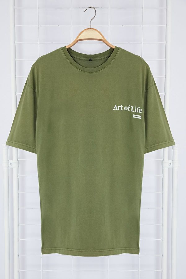 Trendyol Trendyol Khaki Oversize/Wide Cut Faded Effect Text Printed 100% Cotton T-Shirt