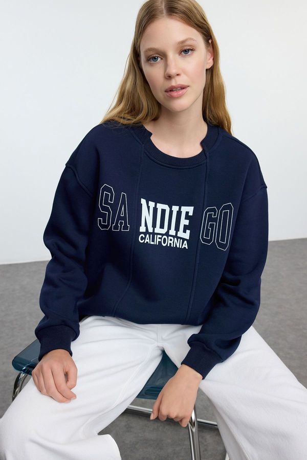 Trendyol Trendyol Navy Blue Slogan Printed Oversize/Wide Fit Knitted Sweatshirt with Hem Detail